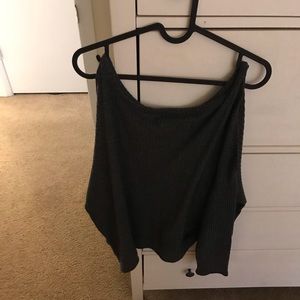 Soft grey sweater with cut outs.